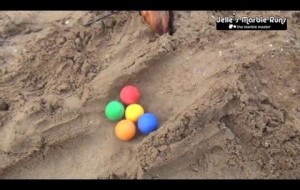 Marbles racing in sand - prepare to be thrilled!